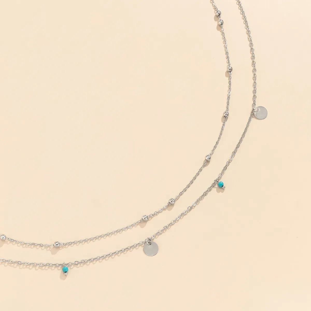 Double-Layered Gold Waist Chain with Disc & Turquoise Charms