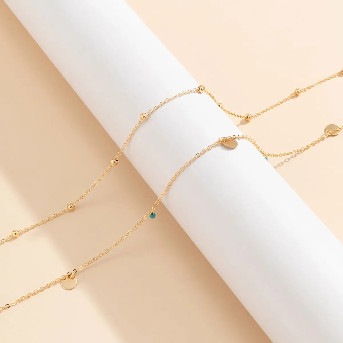 Double-Layered Gold Waist Chain with Disc & Turquoise Charms